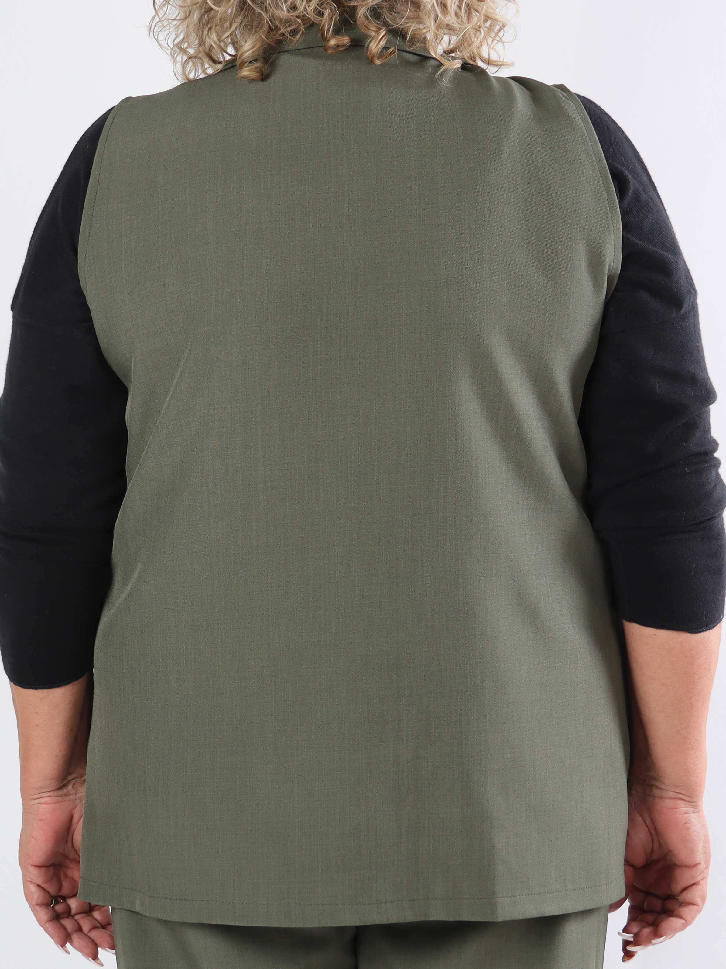 Shadia Vest - Enfärgad kostymväst med knapp och